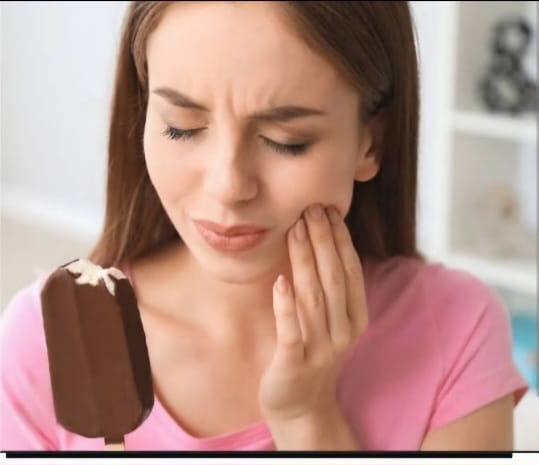 Illustration showing causes of tooth sensitivity